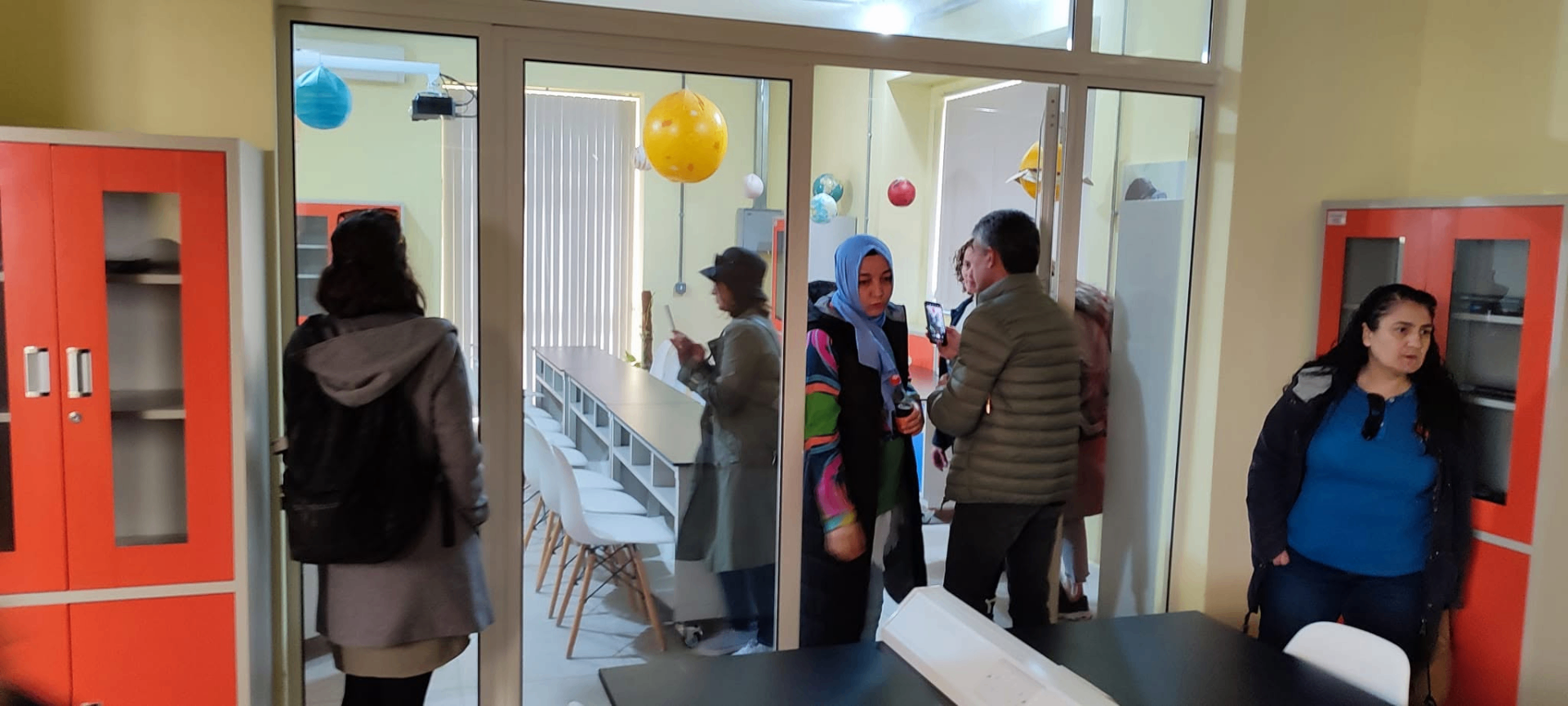 Educators visiting a local school during a job-shadowing study visit
