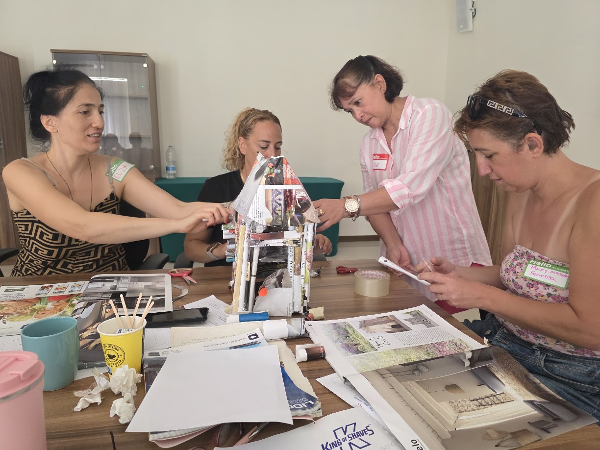 Team members cooperating on a hands-on construction task